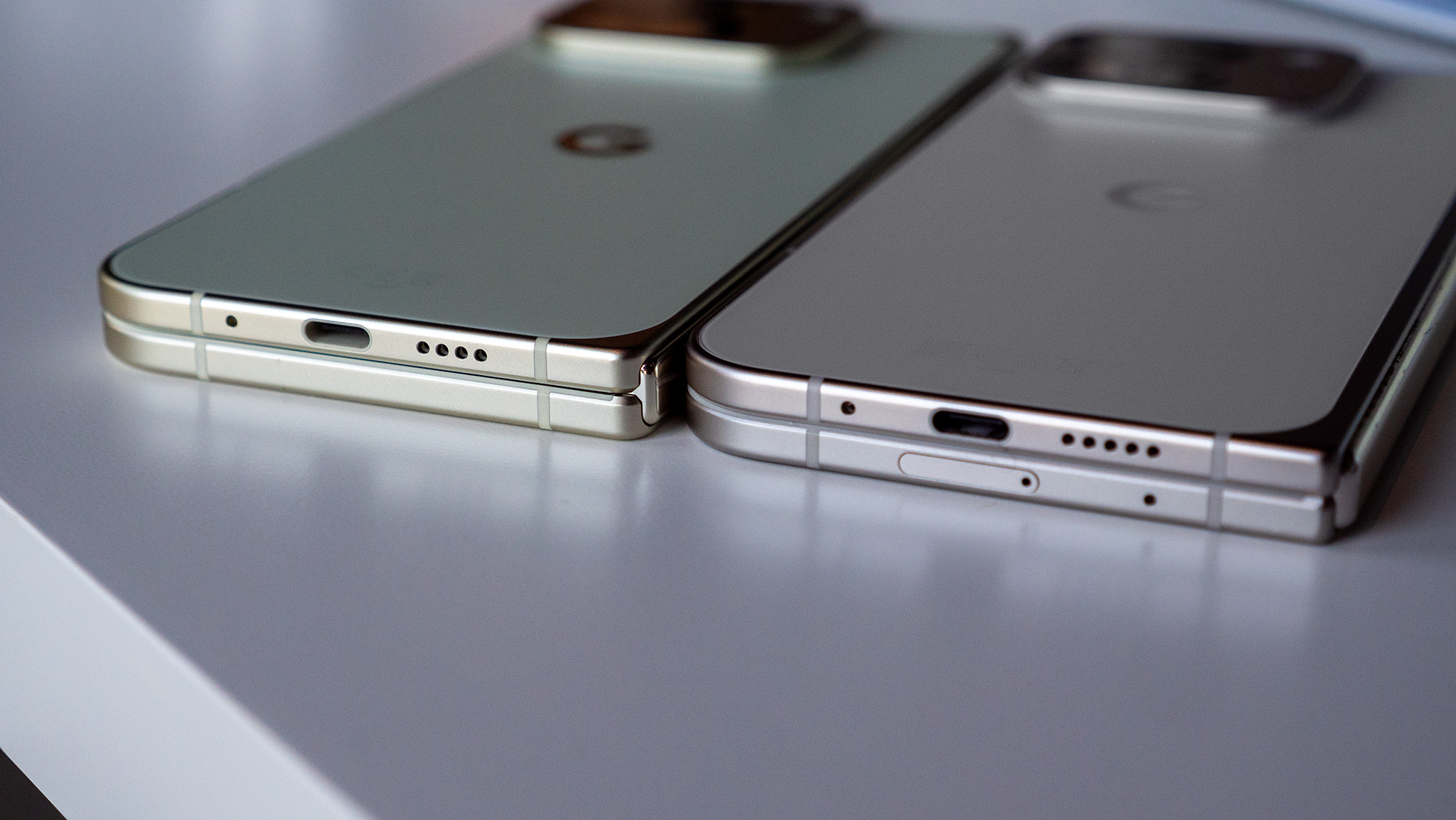 Comparing the Google Pixel 9 Pro Fold (white) with the Google Pixel 10 Pro Fold (green)