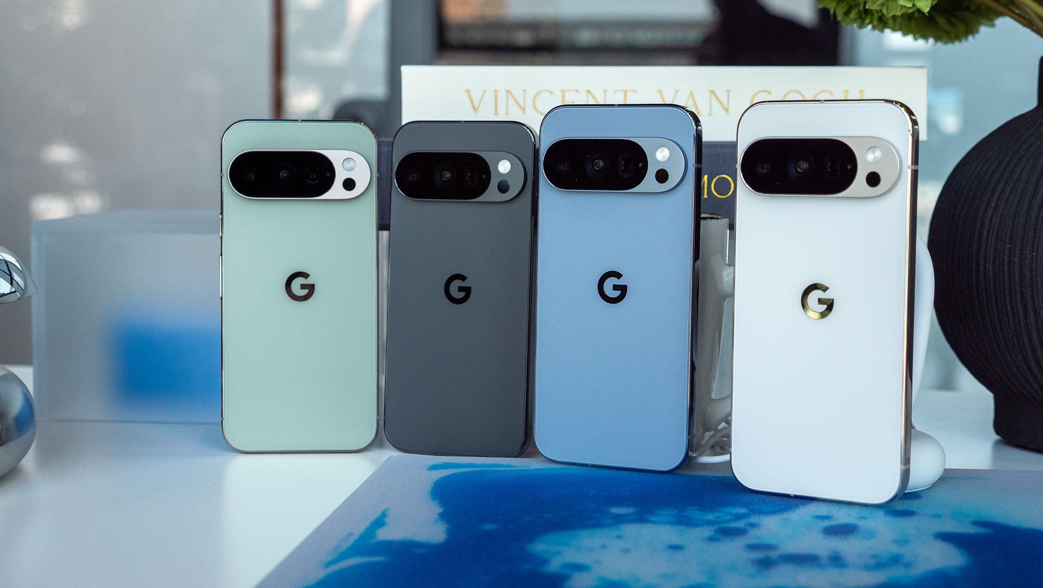 The backs of the Jade and Obsidian Pixel 10 Pro's alongside the Moonstone and Porcelain Pixel 10 Pro XL models